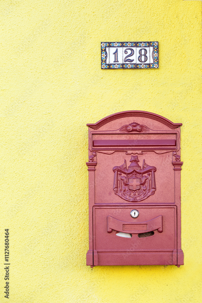 Letterbox on yellow wall, Burano, Venice, Italy Letterbox on yellow wall, Burano, Venice, Italy