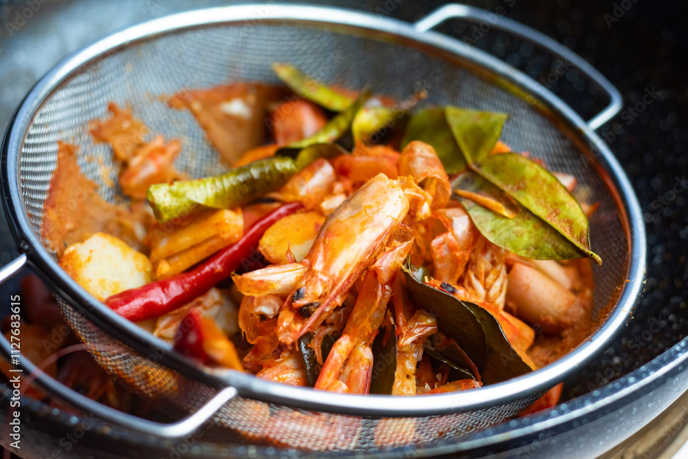Cooking Tom Yum. Cooking Tom Yum.