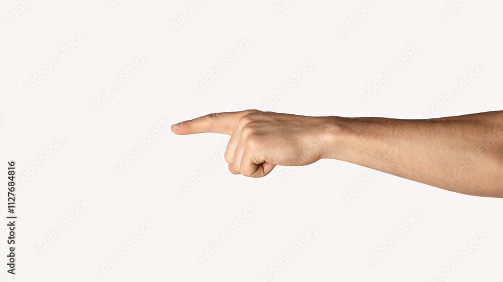 Unrecognizable young an pointing at something on light background, closeup of hand. Panorama Unrecognizable young an pointing at something on light background, closeup of hand. Panorama