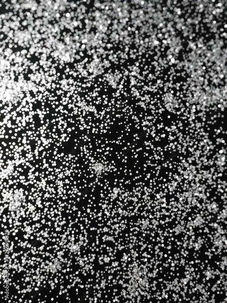 Shiny silver glitter on elegant black background creating a luxurious and sparkly effect, sparkle, elegant Shiny silver glitter on elegant black background creating a luxurious and sparkly effect, sparkle, elegant