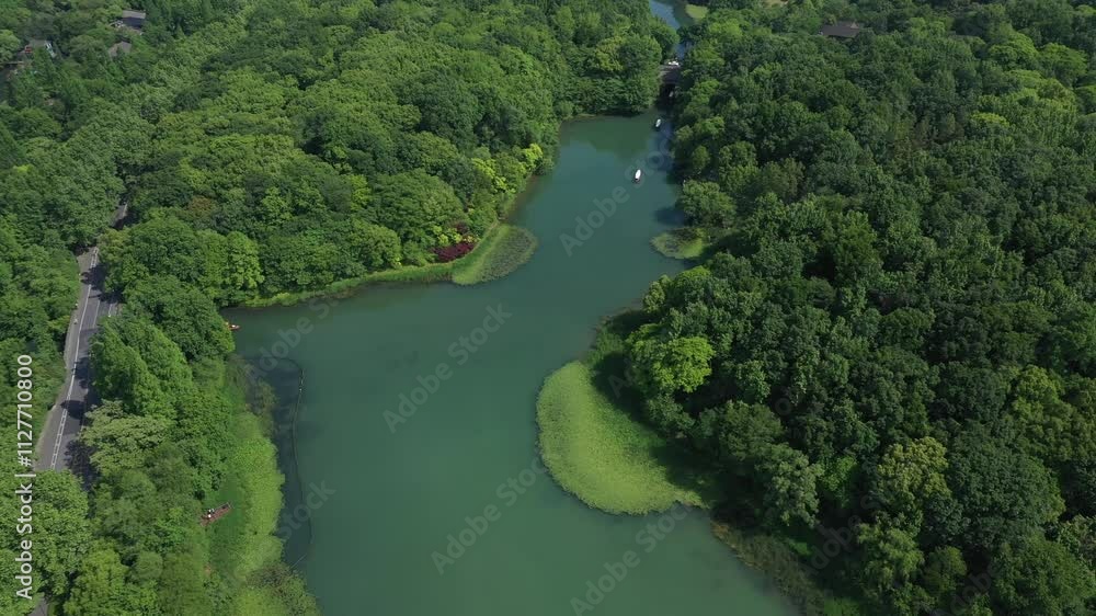 aerial view of natural scenery and cruise boat on west lake ,Hangzhou,China. High quality 4k footage aerial view of natural scenery and cruise boat on west lake ,Hangzhou,China. High quality 4k footage