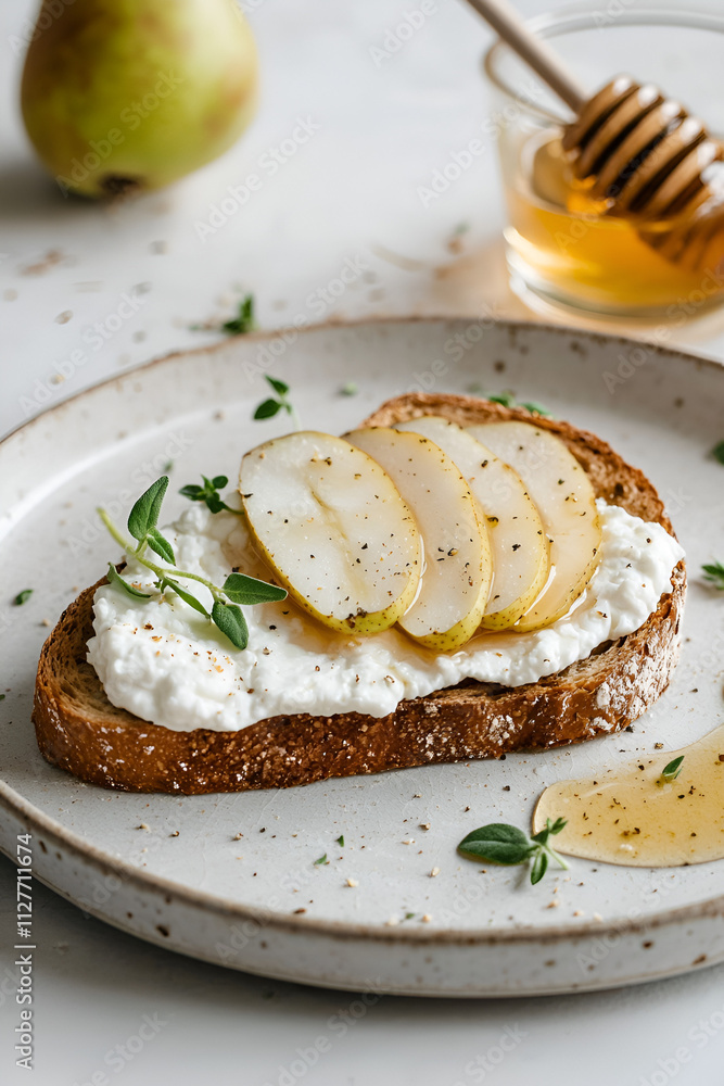 goat cheese, fresh pear, crispy toast, thyme sprigs, honey drizzle, artisan bread, rustic plate, light brunch, healthy snack, gourmet topping, cream cheese, savory toast, golden bread, pear slices goat cheese, fresh pear, crispy toast, thyme sprigs, honey drizzle, artisan bread, rustic plate, light brunch, healthy snack, gourmet topping, cream cheese, savory toast, golden bread, pear slices