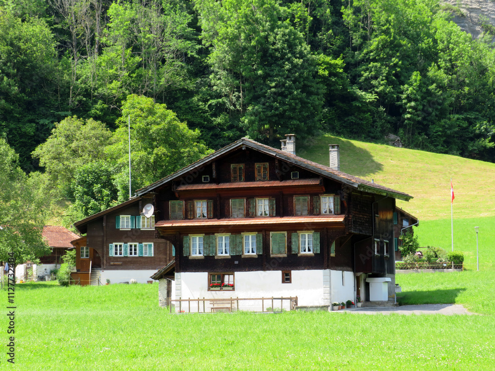 Traditional rural architecture and family livestock farms on the shores of Lake Lungern - Canton of Obwald, Switzerland (Traditionelle Architektur am Ufer des Lungernsees - Schweiz) Traditional rural architecture and family livestock farms on the shores of Lake Lungern - Canton of Obwald, Switzerland (Traditionelle Architektur am Ufer des Lungernsees - Schweiz)
