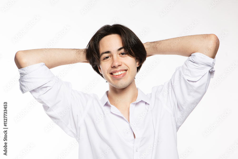 Portrait of a handsome man smiling against white background. Successful gay looking at camera. Portrait of a handsome man smiling against white background. Successful gay looking at camera.