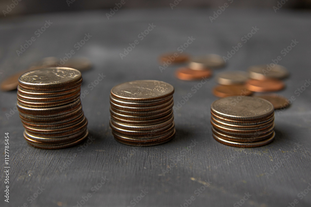 Coins in a jar and money savings for the future Coins in a jar and money savings for the future
