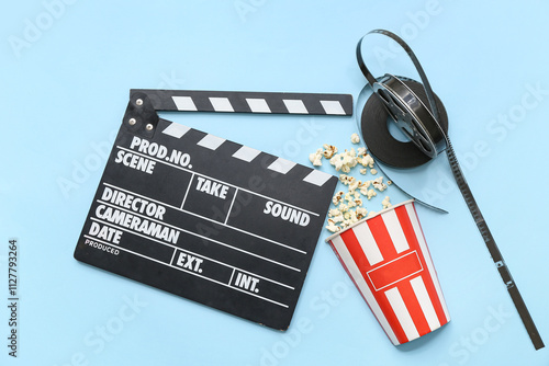 Movie clapper with popcorn ...