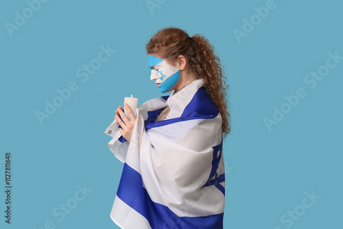 Young woman with flag of Is...