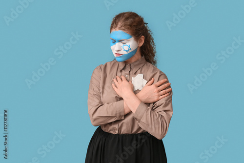 Young woman with painted fl...