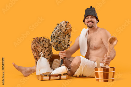 Handsome man with sauna sup...