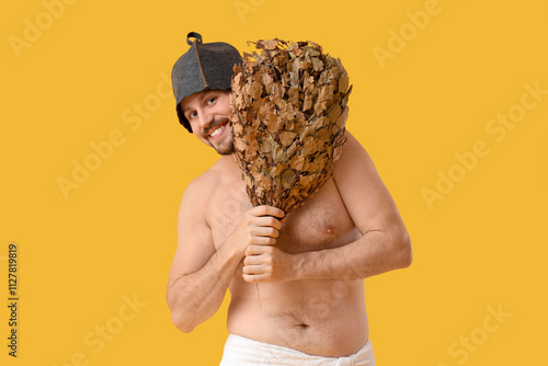 Handsome man with sauna whi...