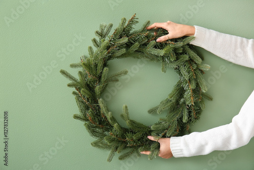 Woman's hands arranging a g...