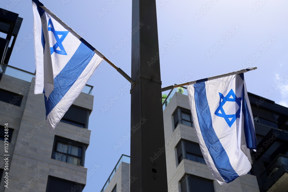 Naklejka premium White and blue flag of Israel with the Star of David.