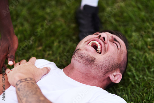 Fotografi Man, screaming and shoulder pain with sports injury on grass field for emergency, medical attention or accident