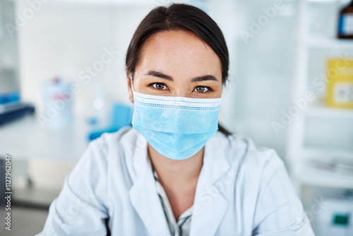 Portrait, woman and scientist with face mask for medical research, innovation and phd in science lab. Female person, ppe and confidence in pharmaceutical, chemistry and biotech for future or progress