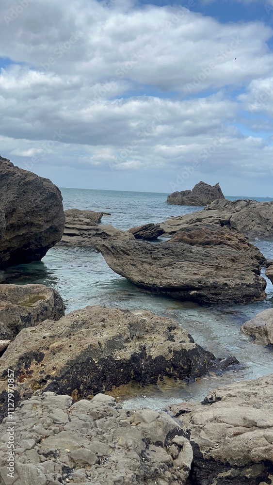 Walking trail near Takapuna beach with massive rocks. Walking trail near Takapuna beach with massive rocks.