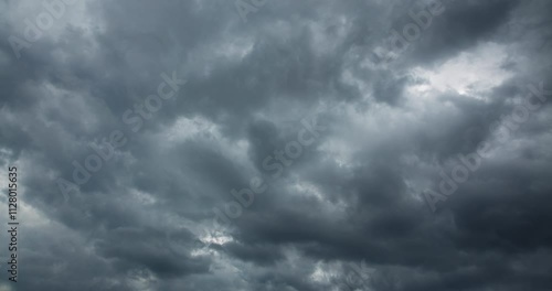 Timelapse of dark unstable storm clouds brewing in the sky