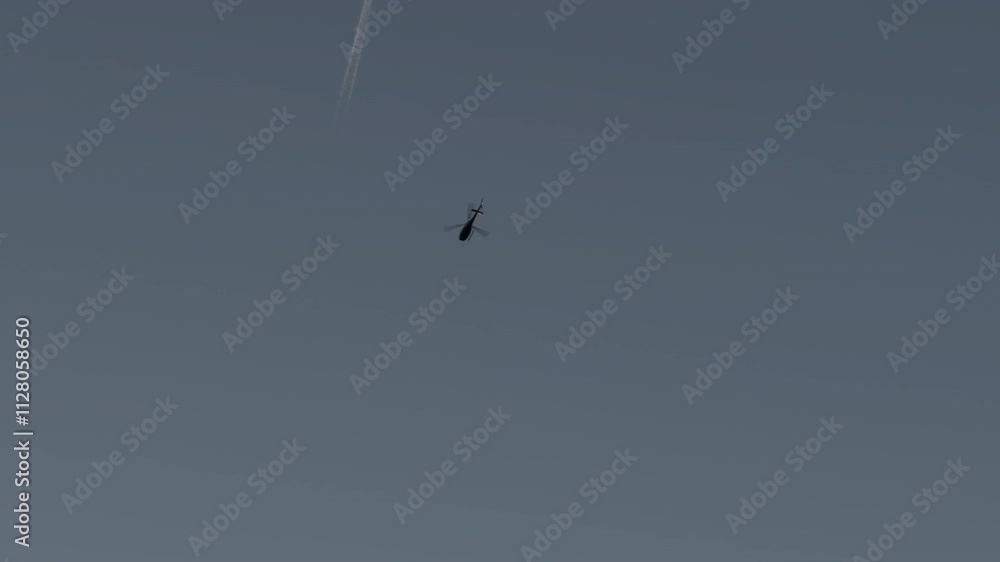 News helicopter hovering over crime scenes for the news. top down view News helicopter hovering over crime scenes for the news. top down view