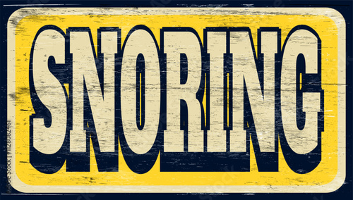 Aged vintage snoring sign on wood