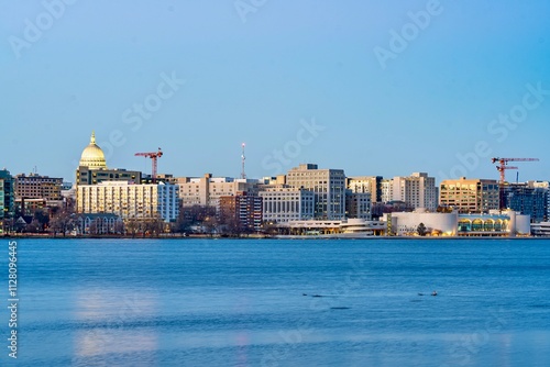 Downtown Madison, WI and the Wisconsin State Capitol Building behind Lake Monona at Twilight