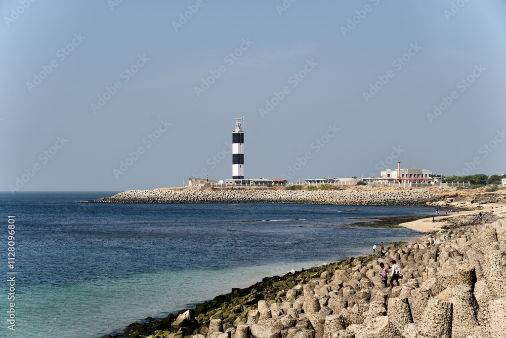 The majestic Dwarka Lighthouse facing the Arabian Sea