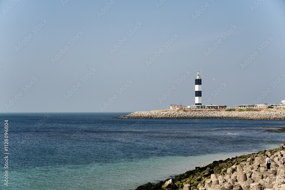 The majestic Dwarka Lighthouse facing the Arabian Sea