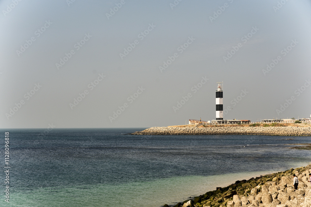 The majestic Dwarka Lighthouse facing the Arabian Sea