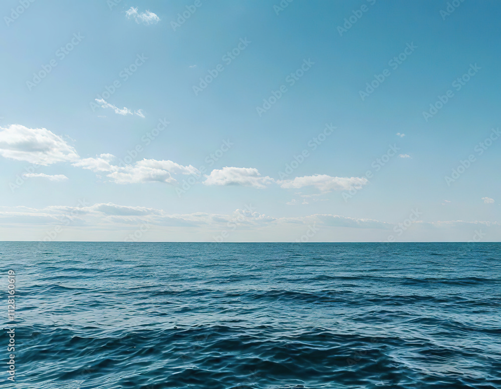 Fototapeta premium seascape background. sea and sky meet on the horizon. delicate blue color