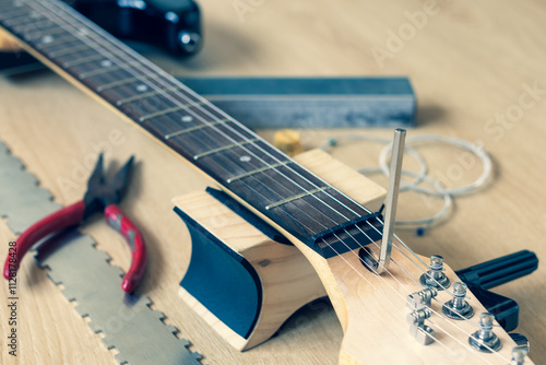 guitar repair, adjustment concept