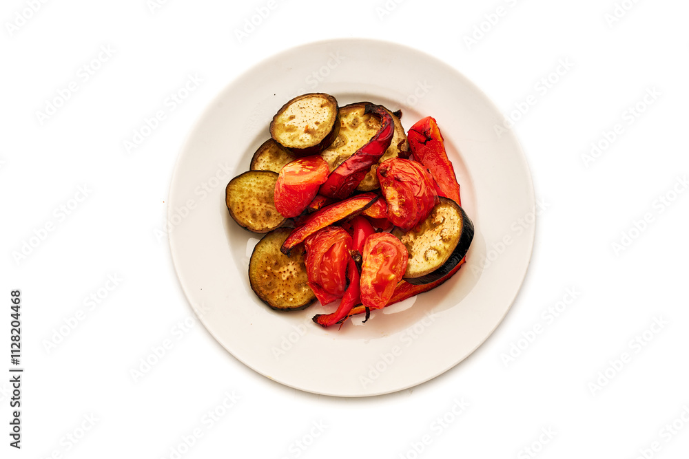 A plate of vegetables including tomatoes and peppers A plate of vegetables including tomatoes and peppers