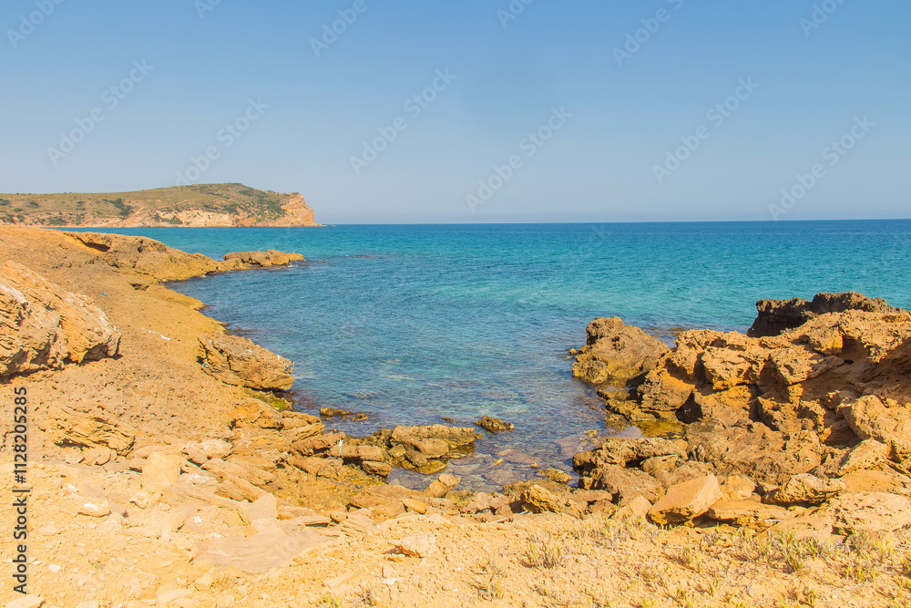 Rocky Beach with Ocean and Mountain Views at Cap Fartas, Korbous, Tunisia Rocky Beach with Ocean and Mountain Views at Cap Fartas, Korbous, Tunisia