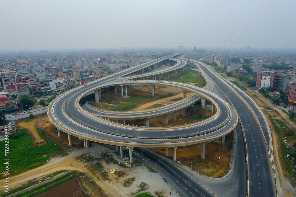 Naklejka premium highway with a large round curve in the middle. The road is empty and there are no cars on it