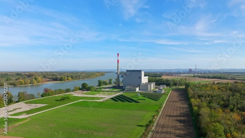 River, Green Fields And AKW Zwentendorf Museum In Zwentendorf, Austria - Drone Shot photo