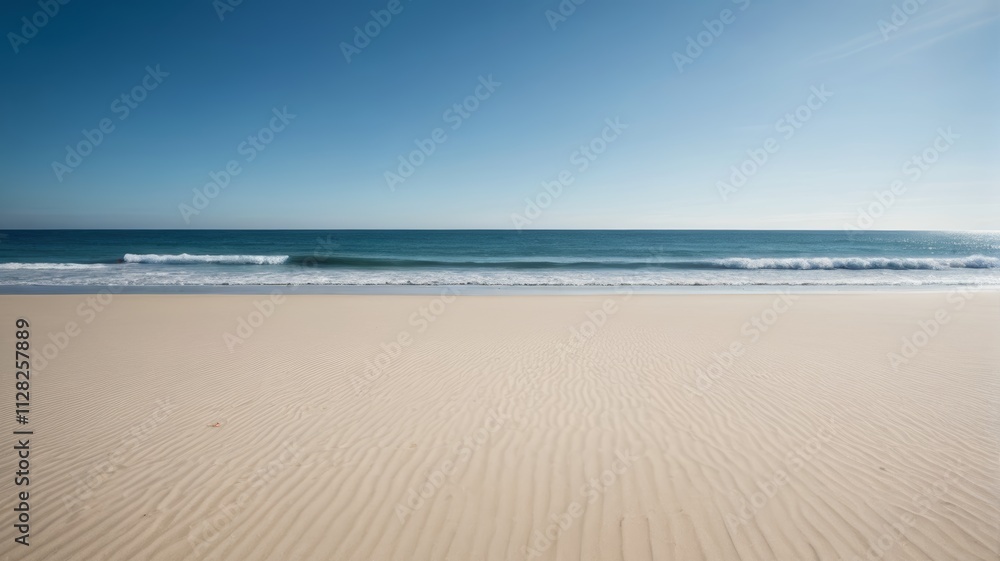 a sandy beach with waves crashing on the shore a sandy beach with waves crashing on the shore