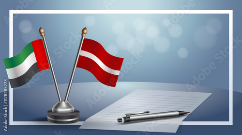 United Arab Emirate and Latvia National flags on small table with bokeh background, cooperative relationship