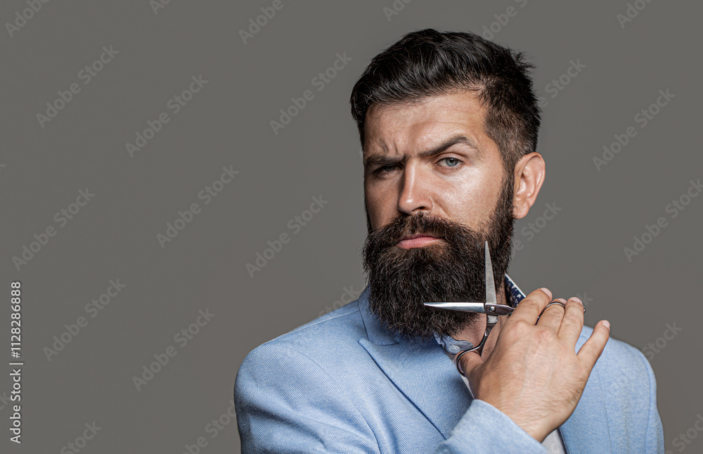 Male in barbershop, suit. Bearded man isolated on gray background. Mens haircut in barber shop. Barber scissors, barber shop. Barber scissors. Copy space. Male in barbershop, suit. Bearded man isolated on gray background. Mens haircut in barber shop. Barber scissors, barber shop. Barber scissors. Copy space.