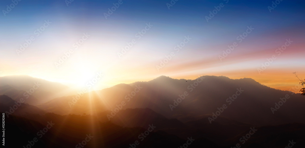 Sunset in the mountains. Panoramic view of the mountain and the sky. Sunset in the mountains. Panoramic view of the mountain and the sky.