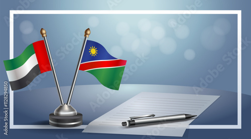 United Arab Emirate and Namibia National flags on small table with bokeh background, cooperative relationship