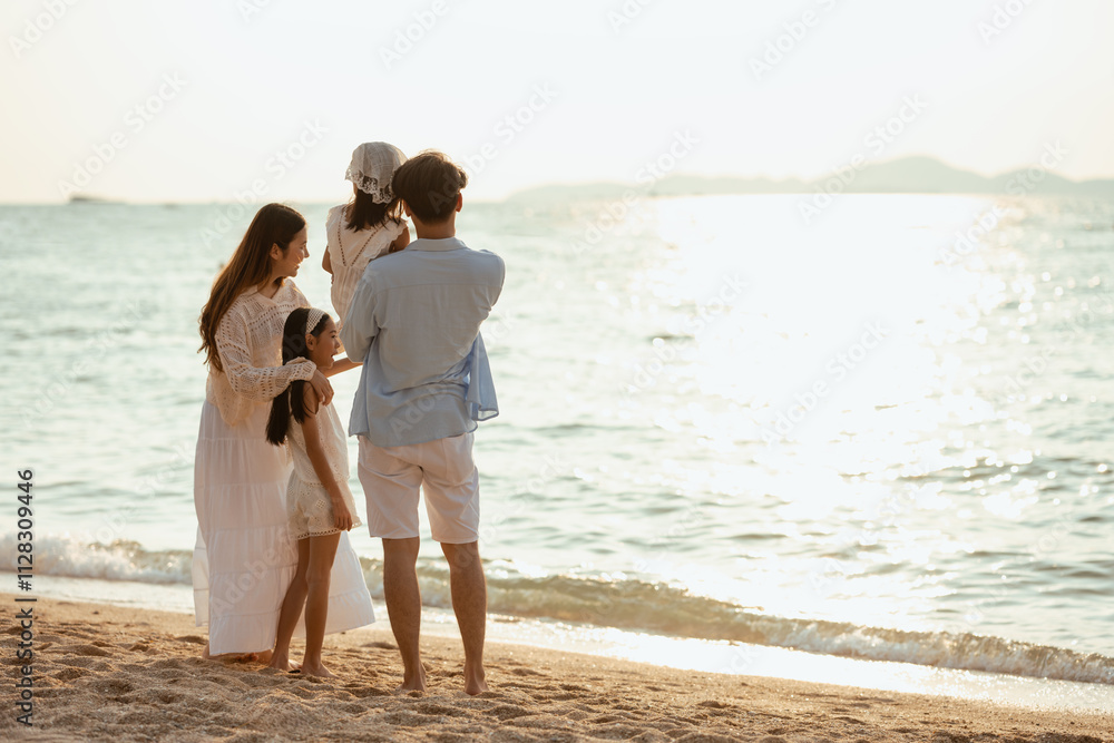 children, parent, family, relaxation, kid, friends, kids, parents, relaxed, together. A family of four is standing on the beach. Scene is happy and relaxed, as the family enjoys their time together. children, parent, family, relaxation, kid, friends, kids, parents, relaxed, together. A family of four is standing on the beach. Scene is happy and relaxed, as the family enjoys their time together.