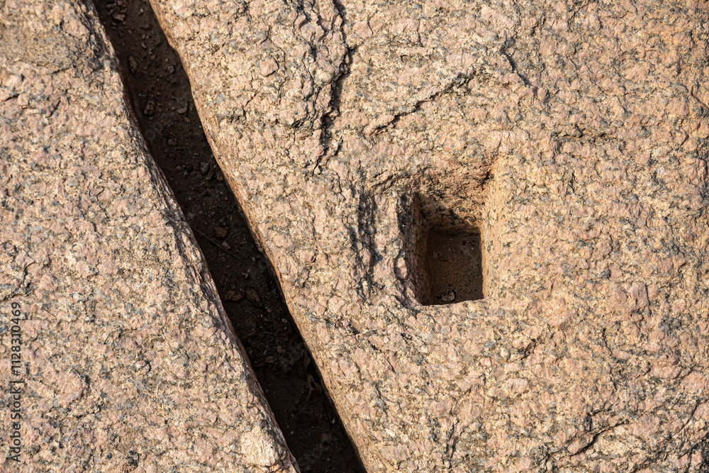 Ancient stone pit in the city of Aswan