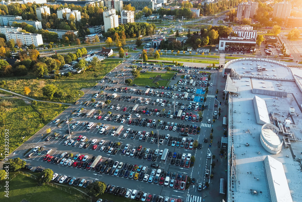 Drone shot of parking lot beside shopping center