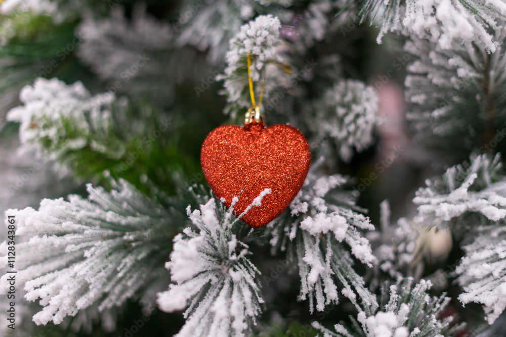 Fototapeta premium Red Heart Shaped Christmas Tree Ornament