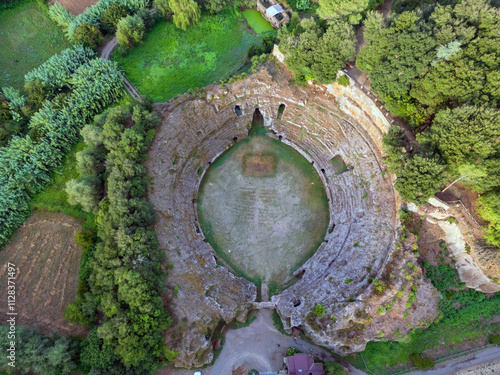 Obraz na płótnie Aerial view of the Roman Amphitheater of Sutri, the history of an ancient landscape and a country. w salonie