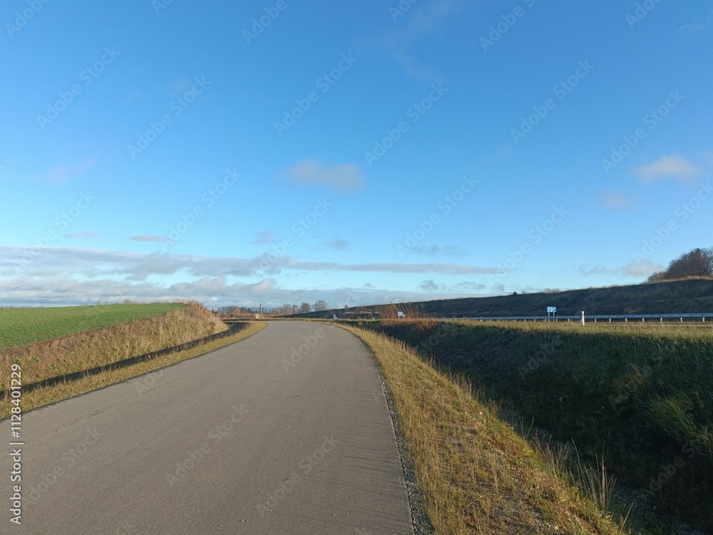 Completed road in Motiekaicio street. New road in Siaulai. Finished road in suburbs. Fields at side. Baigta gatve Motiekaicio gatveje Siauliuose. Completed road in Motiekaicio street. New road in Siaulai. Finished road in suburbs. Fields at side. Baigta gatve Motiekaicio gatveje Siauliuose.