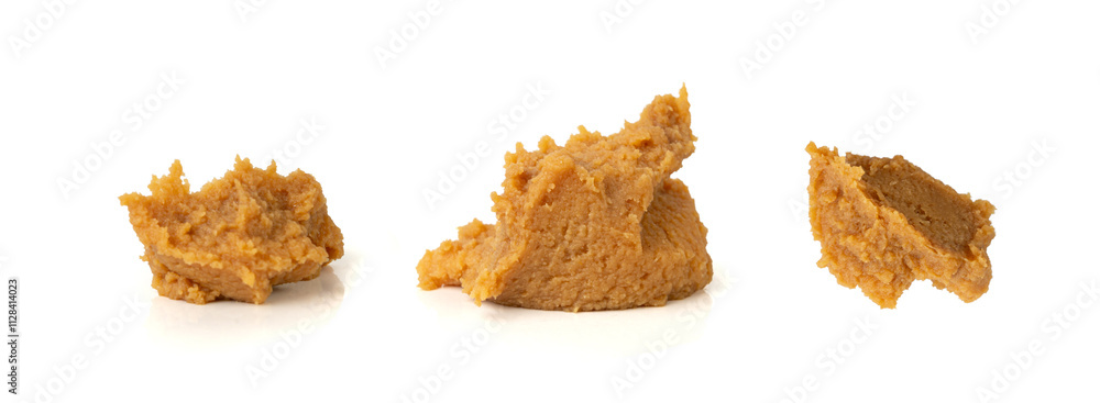 Miso paste isolated. Japanese shiro miso seasoning sauce, fermented soybean spread, brown soy cream Miso paste isolated. Japanese shiro miso seasoning sauce, fermented soybean spread, brown soy cream