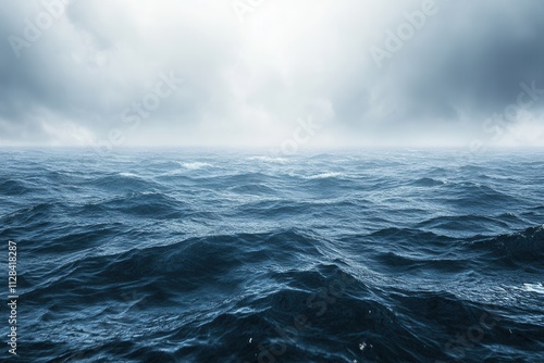 Serene ocean view under a cloudy sky.