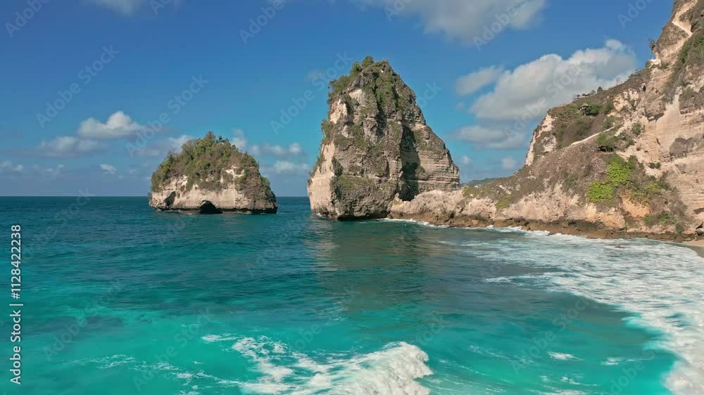 Azure ocean water coming on shore of Diamond Beach in Bali, Indonesia. Azure ocean water coming on shore of Diamond Beach in Bali, Indonesia.