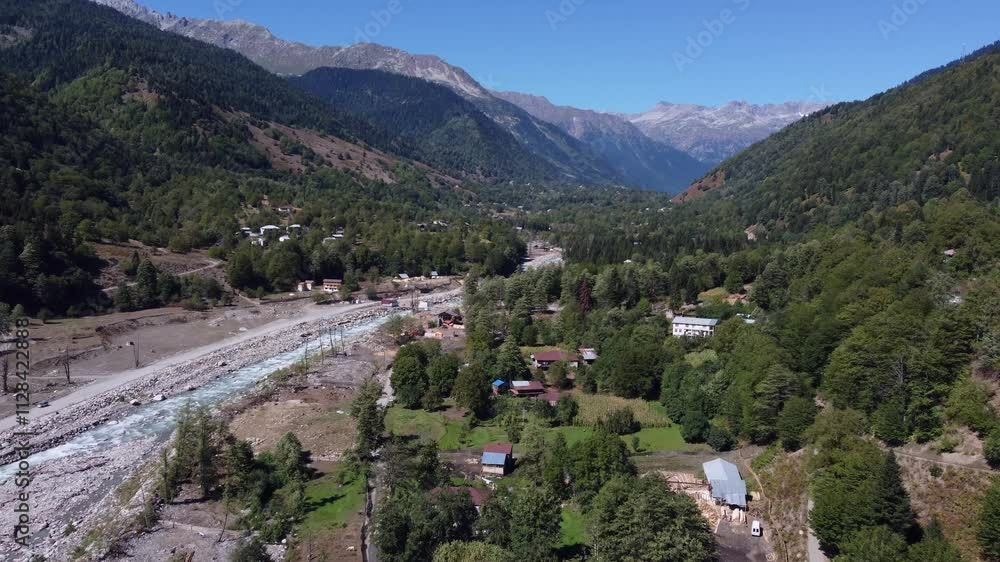 Flyover tiny river valley village of Kvemo Marghi in Georgia Caucasus Flyover tiny river valley village of Kvemo Marghi in Georgia Caucasus