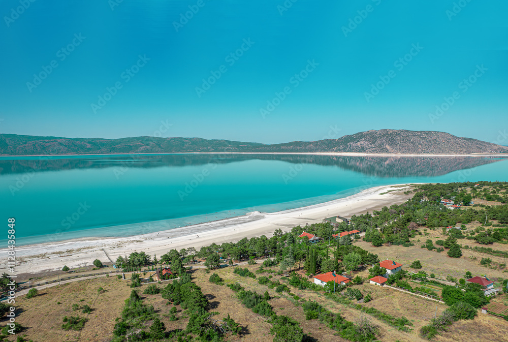 On the shores of Salda Lake. Salda Lake is a popular travel destination for people coming from the region and outside the region due to the hydromagnesite mineral it contains. Burdur - Türkiye