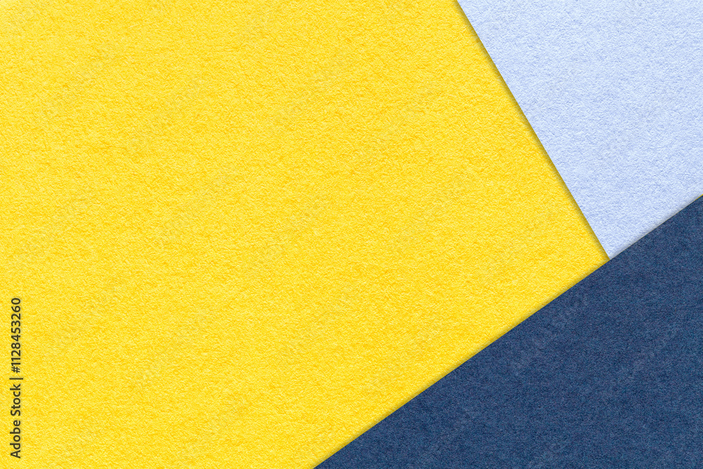 Texture craft yellow paper background with sky and navy blue border. Vintage abstract golden cardboard. Texture craft yellow paper background with sky and navy blue border. Vintage abstract golden cardboard.