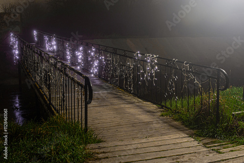 Wooden bridge. Night. Mist